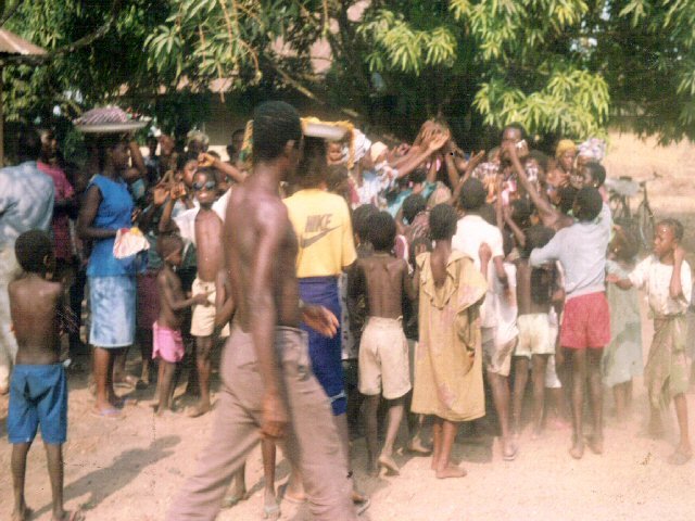 sierra.leone.post.war.reconstruction. Aid being distributed to displaced people at Mile 91 - 1996