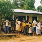 fioh.fund.sierra.leone.post.war.reconstruction. Internall displaced people queuing for food at Mile 91-1999